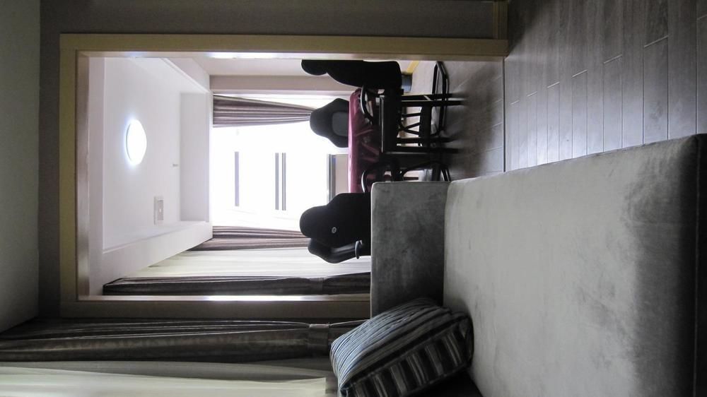 Sheng Jing Yi Jia Hotel Huji Exterior photo