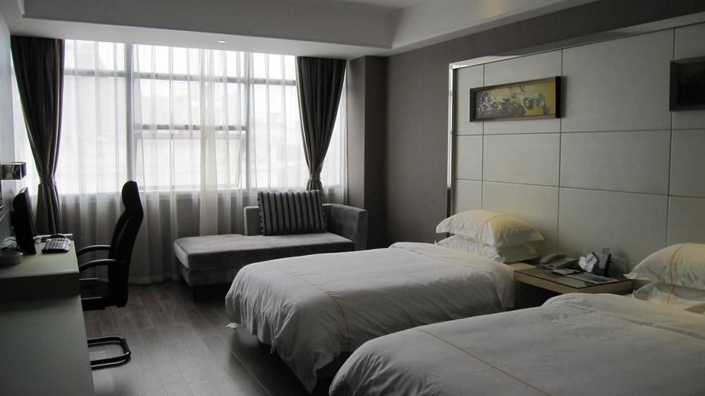Sheng Jing Yi Jia Hotel Huji Exterior photo